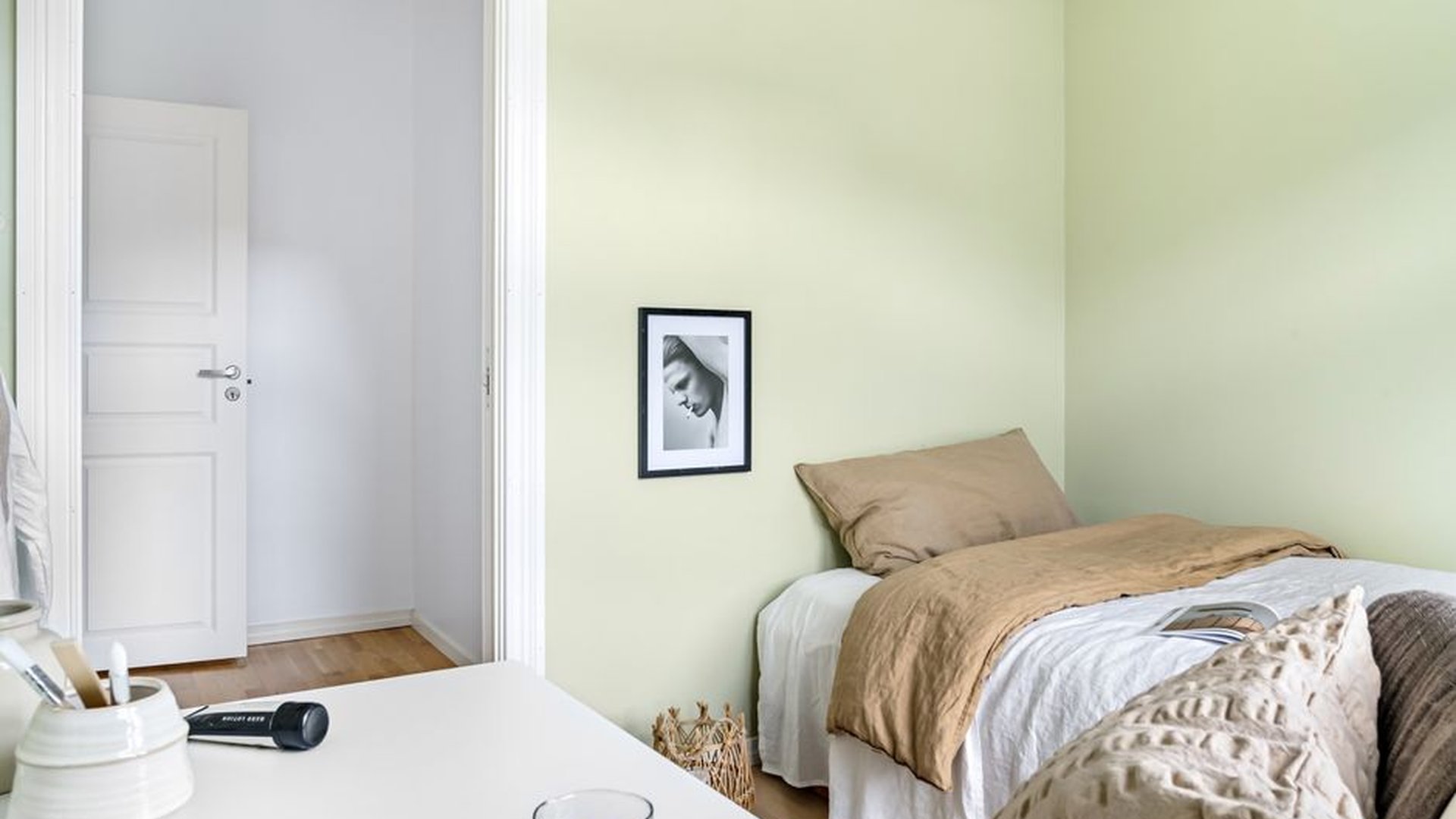 soft green walls beige bedding dusty blue accent p